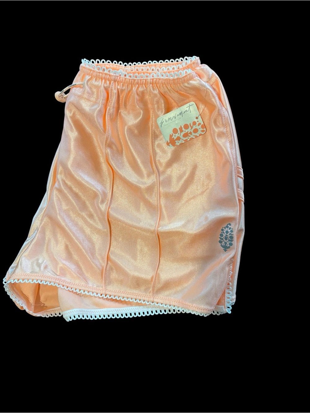 Free People Movement Roll With It shorts in pastel peach size Small NWT